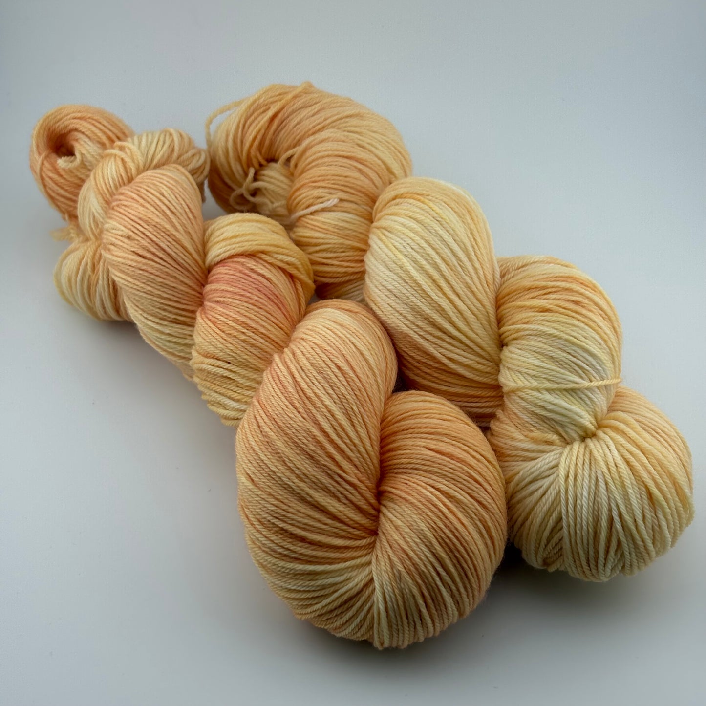 Creamsicle Hand Dyed Fingering Weight Yarn