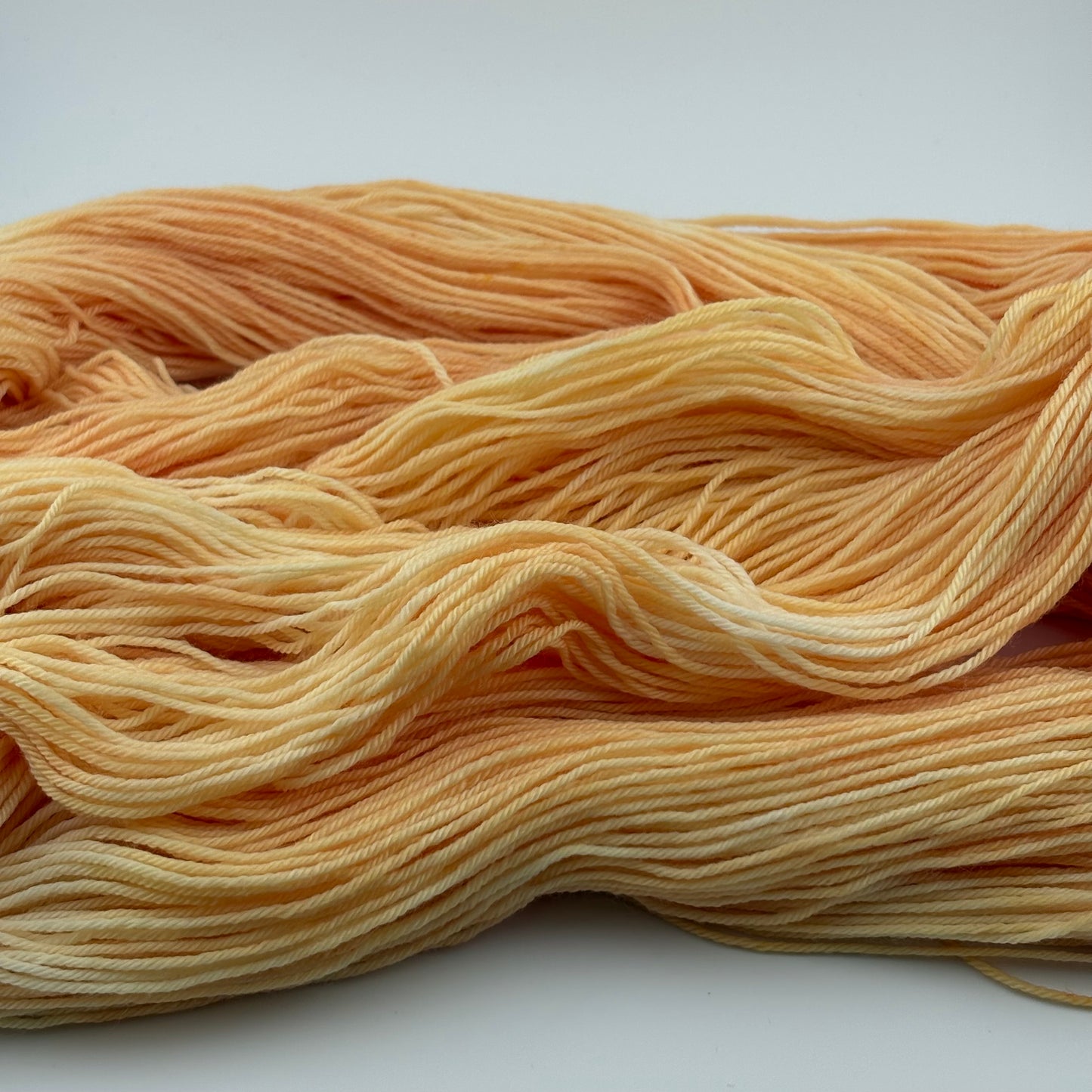 Creamsicle Hand Dyed Fingering Weight Yarn